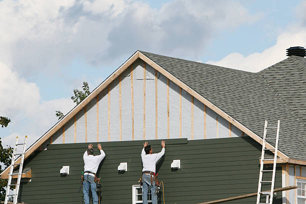 Professional Storm Damage Siding Repair technician working in Robbins, IL